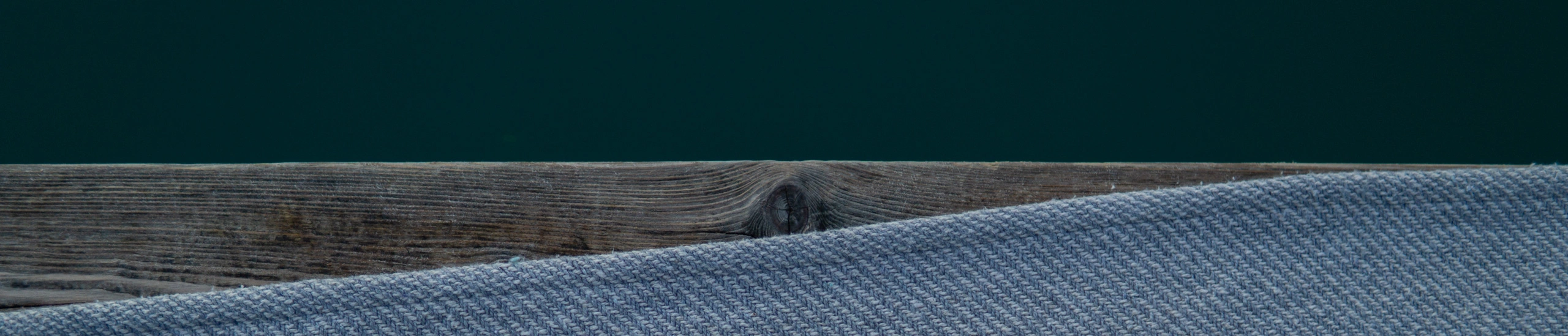 blanket on a bridge near a lake